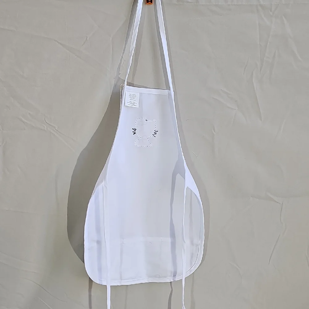 Hobby Lobby White and Pink Hello Kitty Bib with Printed Front Pocket